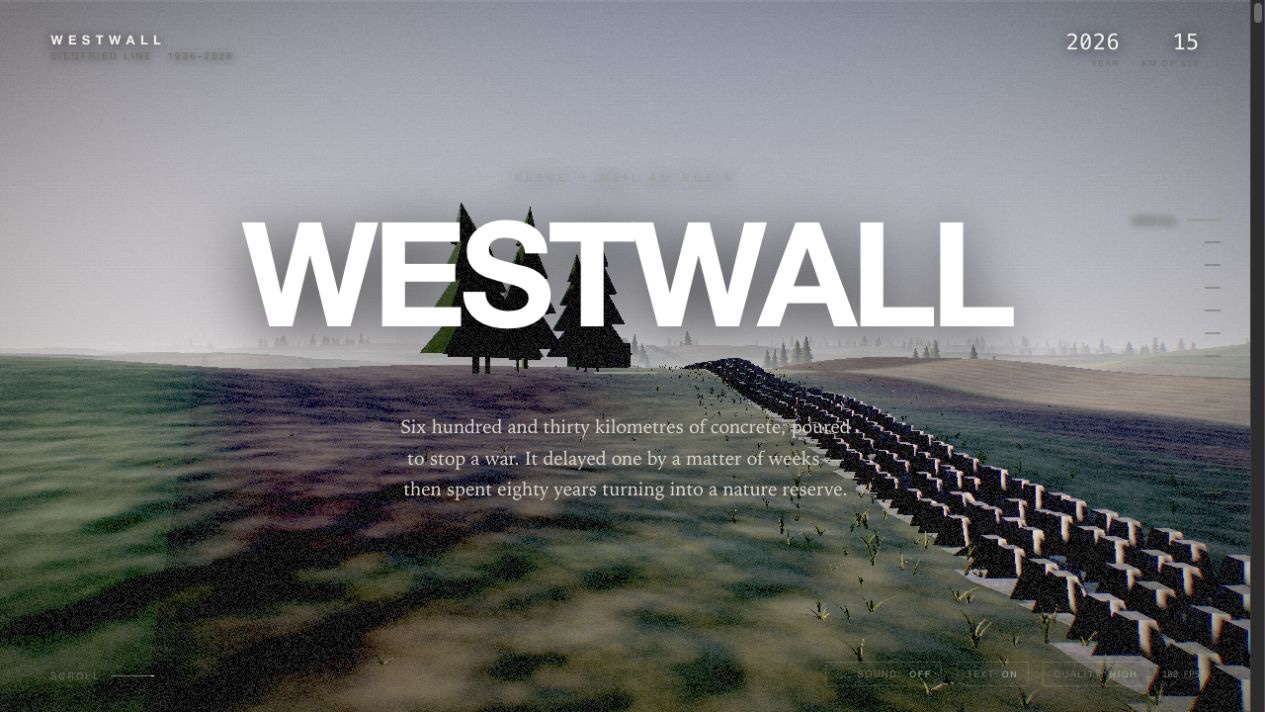 The Westwall experience opening over a misty generated landscape and a long line of concrete obstacles.
